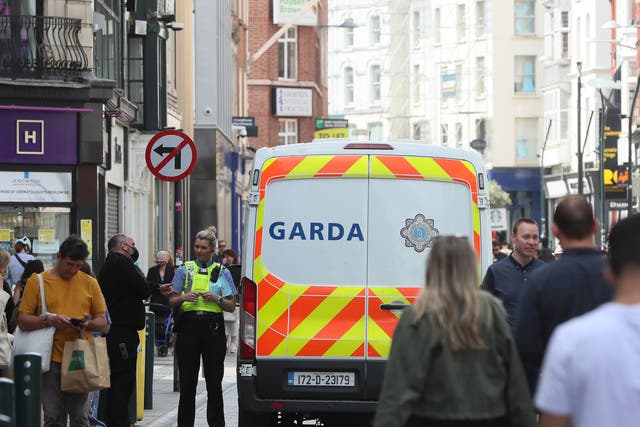 <p>A member of An Garda on Grafton street in Dublin's city centre</p>