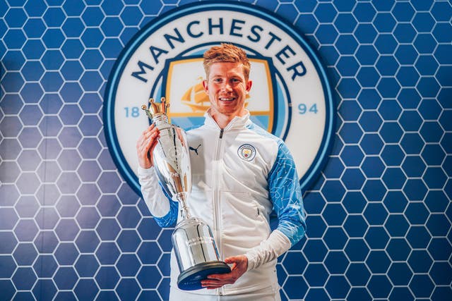 <p>Kevin De Bruyne with the PFA Player of the Year trophy</p>