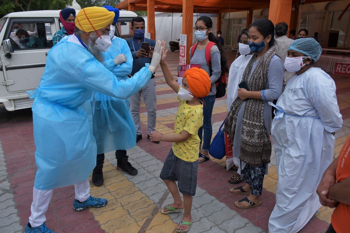 India cautiously starts to open up as virus cases decline