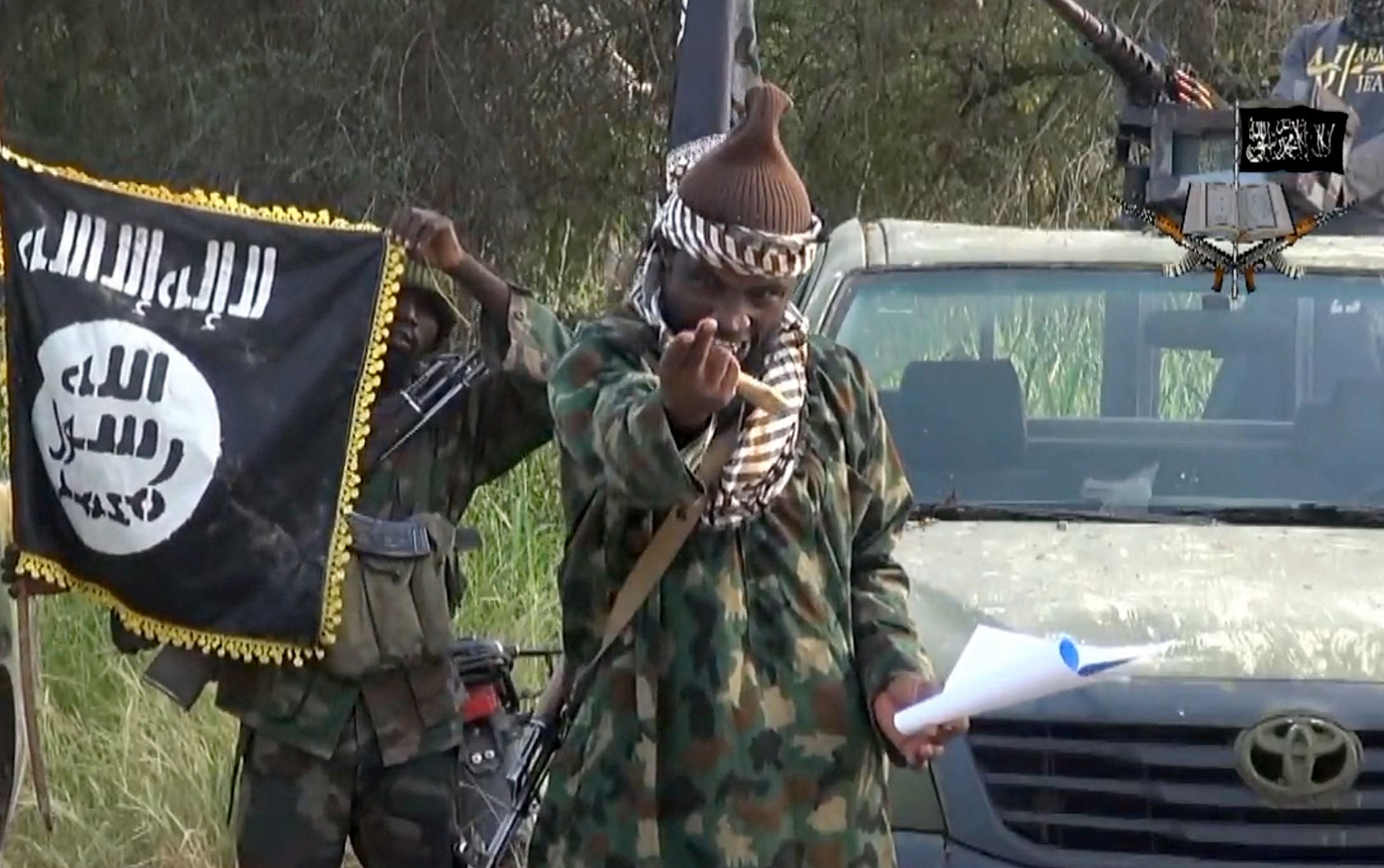 Screengrab from an October 2014 video shows the leader of the Nigerian Islamist extremist group Boko Haram, Abubakar Shekau