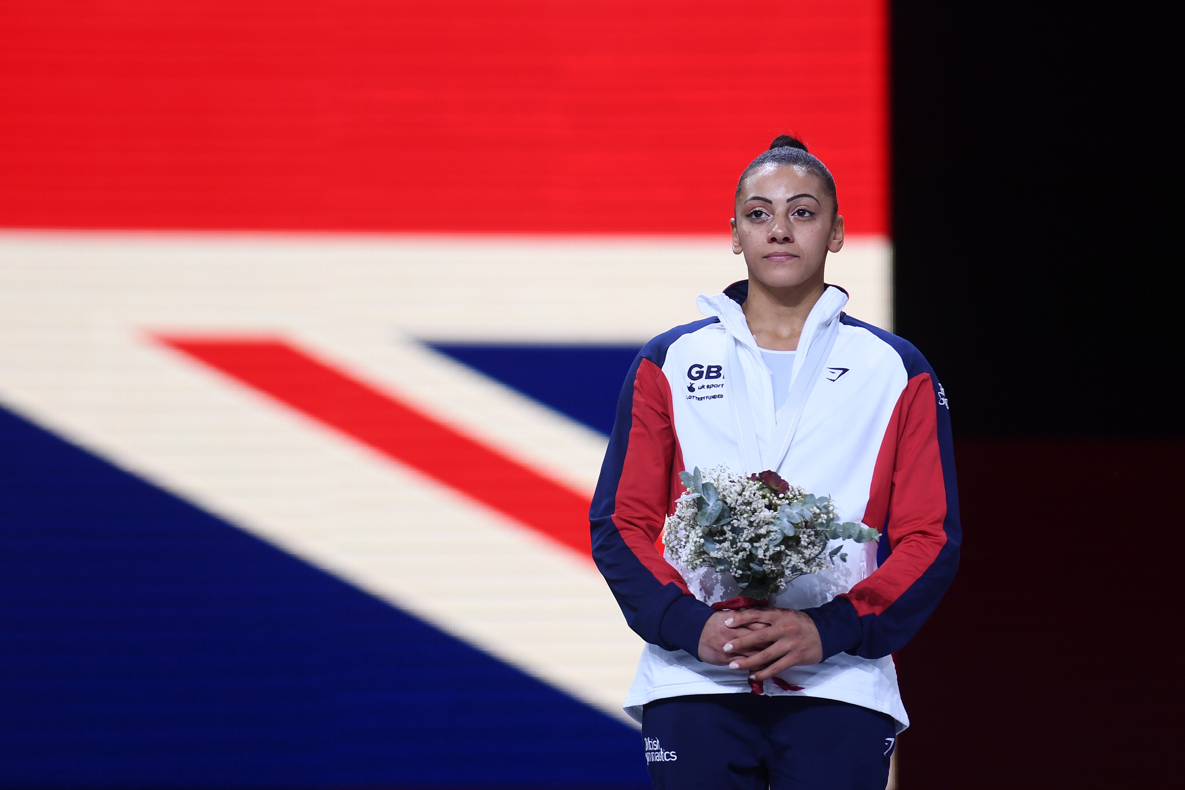 Silver medalist Becky Downie looks on during the medal ceremony for Women’s Uneven Bars Final at the FIG Artistic Gymnastics World Championships