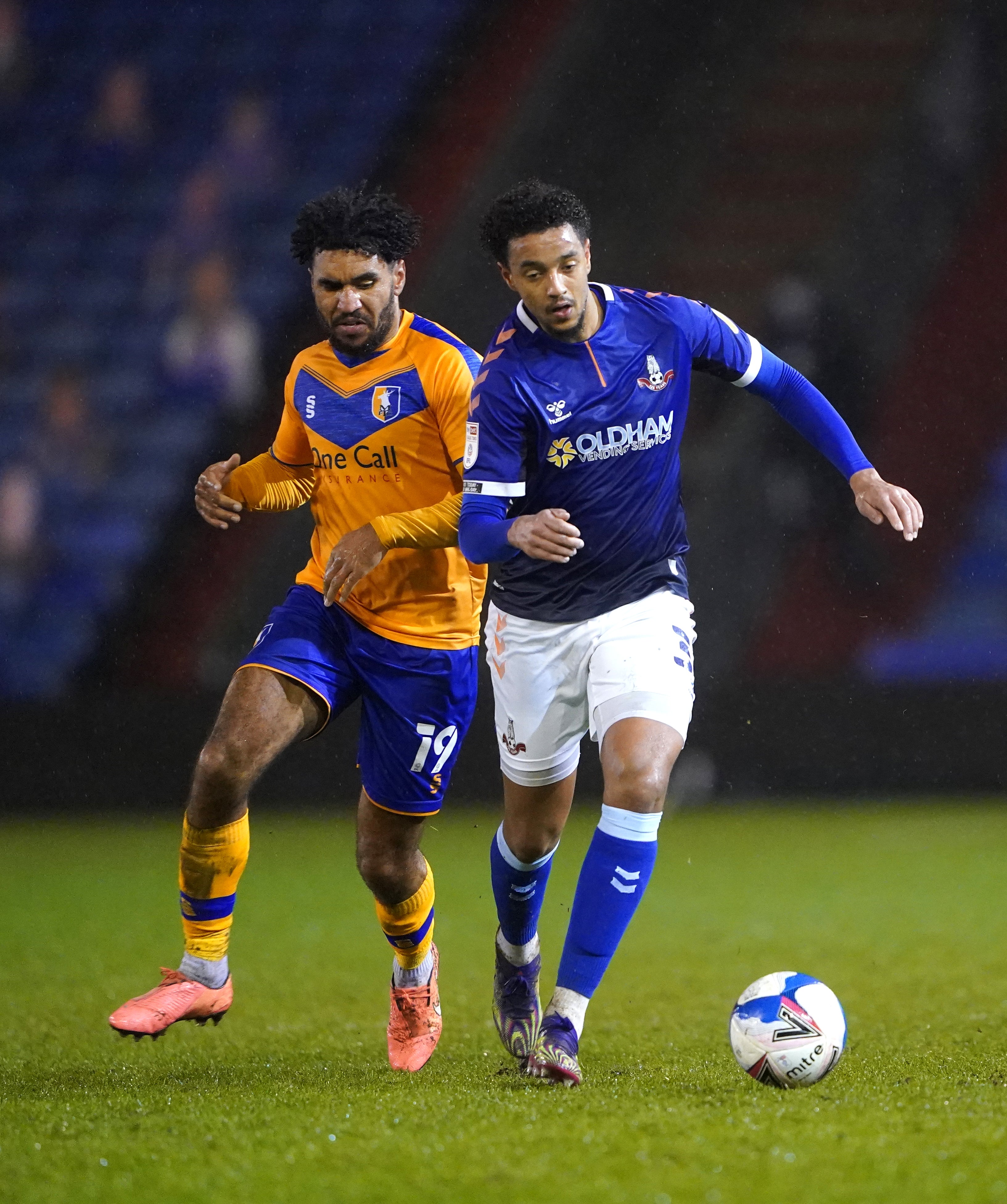 Oldham’s Cameron Borthwick-Jackson (right) will join Burton when his contract expires at the end of the month