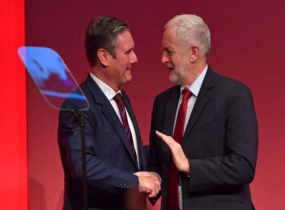 <p>Jeremy Corbyn congratulates his then Brexit Secretary Keir Starmer after he delivers a speech to the Labour Party Conference in Brighton in September 2017</p>