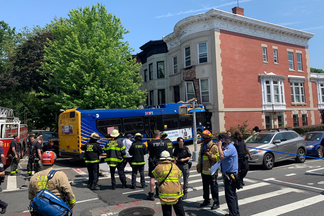 <p>An MTA bus crashed into a residential building in Brooklyn, New York City</p>