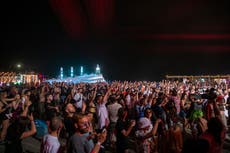 Music fans flock to Albania’s beach festival despite virus