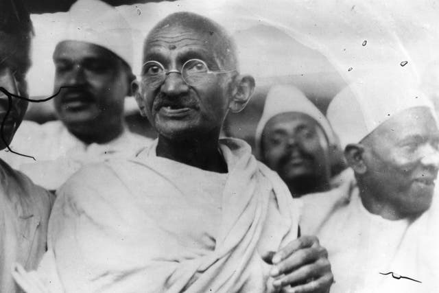 <p>File photo of Mahatma Gandhi (Mohandas Karamchand Gandhi, 1869 - 1948), Indian nationalist and spiritual leader, leading the Salt March in protest against the government monopoly on salt production</p>