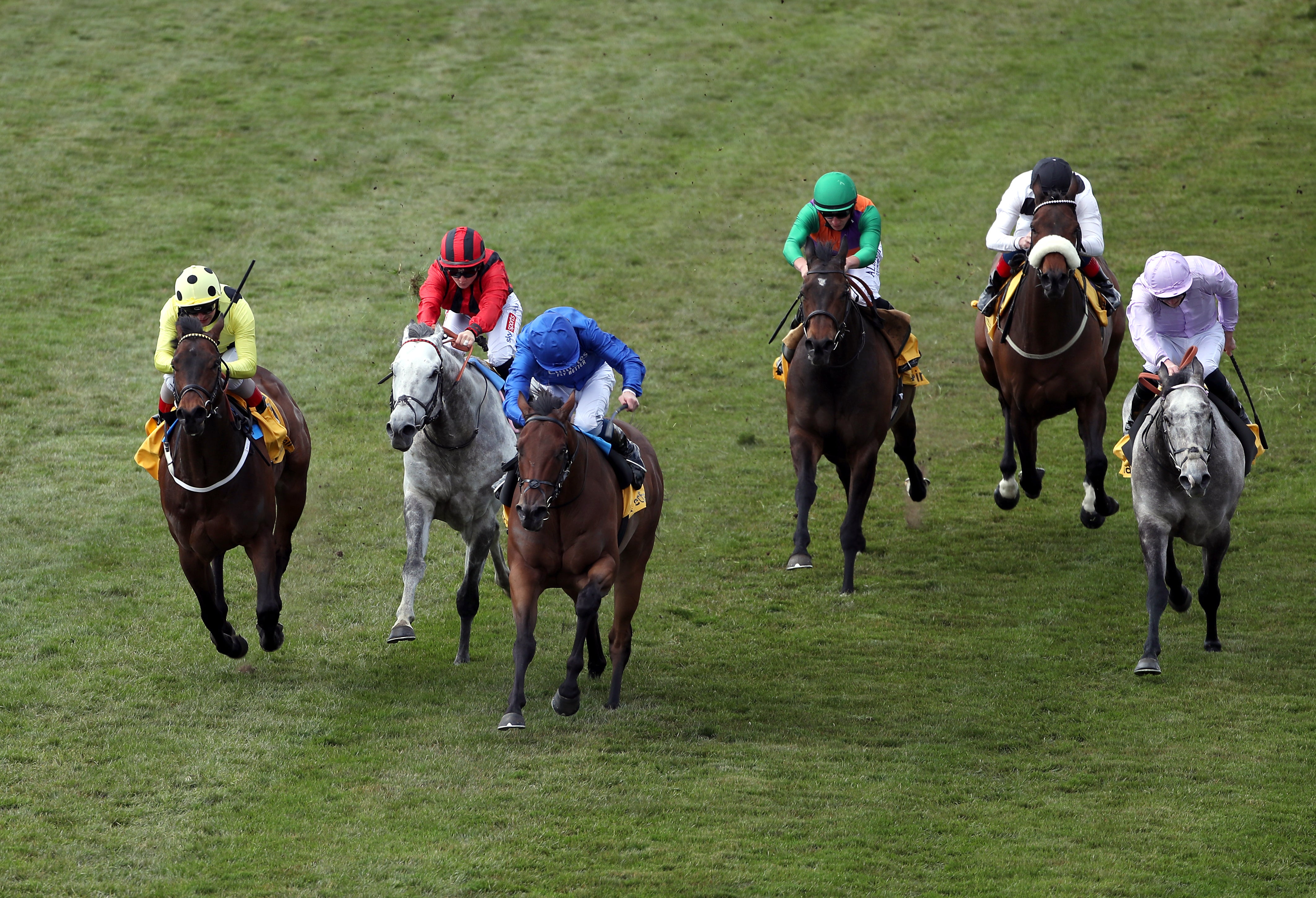 Lazuli and William Buick leading en route to victory in the Betfair Palace House Stakes at Newmarke