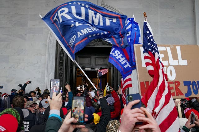 <p>Rioters on the US Capitol on 6 January</p>