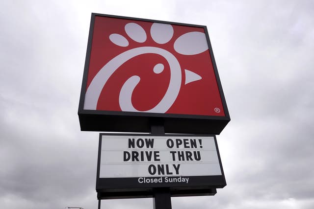 <p> A sign hangs outside of a Chick-fil-A restaurant on 6 May 2021 in Chicago, Illinois</p>