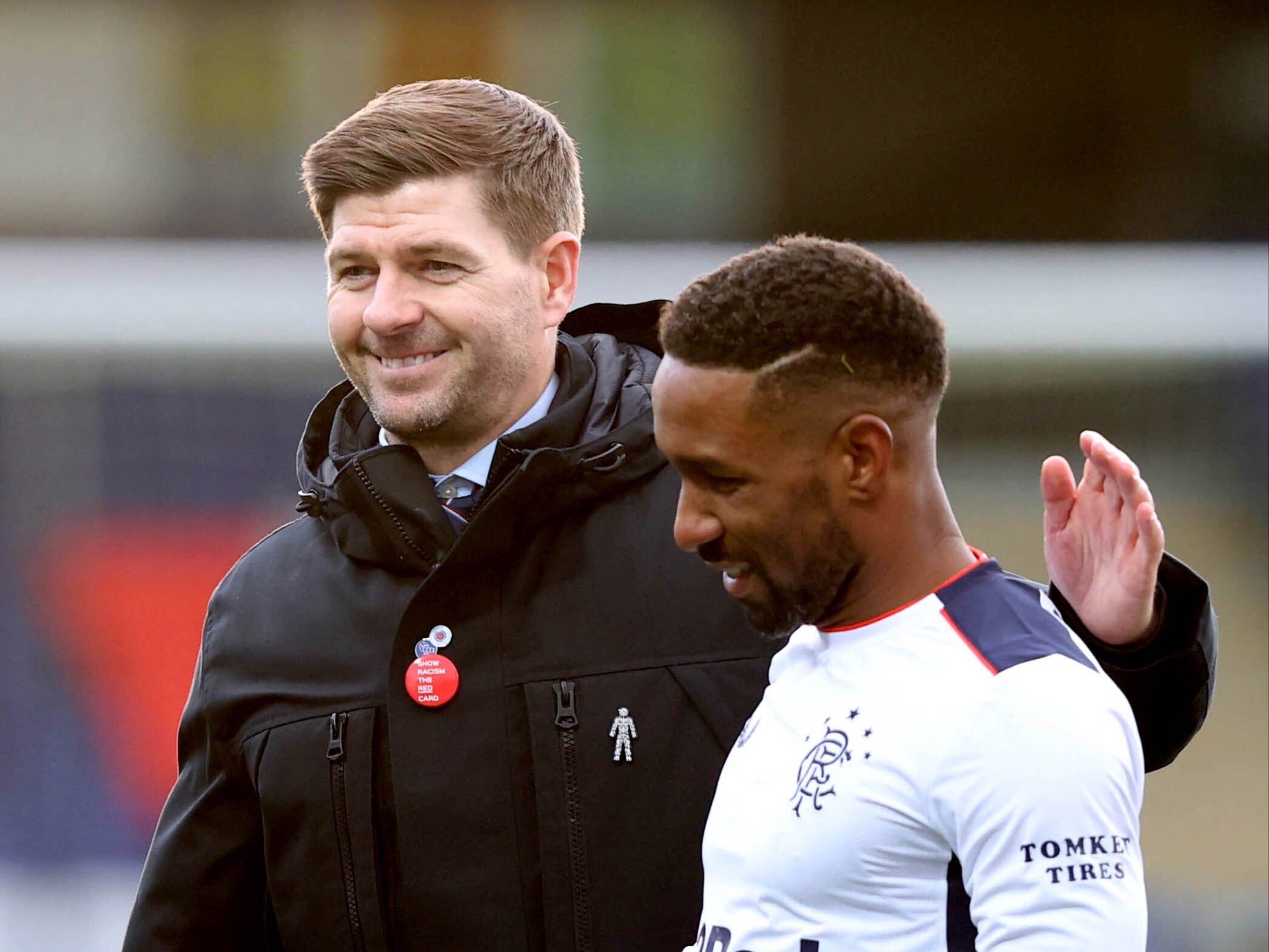 Jermain Defoe (right) embraces Steven Gerrard