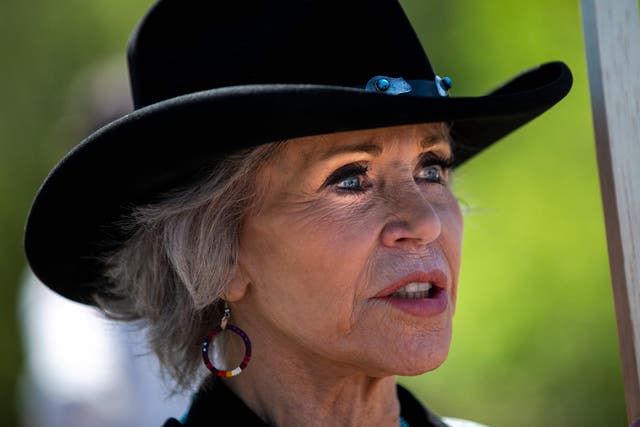 <p>Actress and Climate activist Jane Fonda looks on ahead of taking part in a traditional water ceremony during a rally and march to protest the construction of Enbridge Line 3 pipeline in Solvay, Minnesota on 7 June 2021</p>