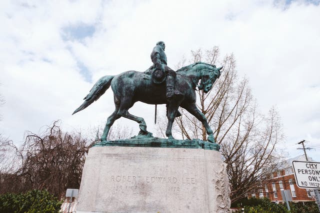 <p>A statue of Confederate General Robert E. Lee is seen in Market Street Park on April 1, 2021 in Charlottesville, Virginia. </p>