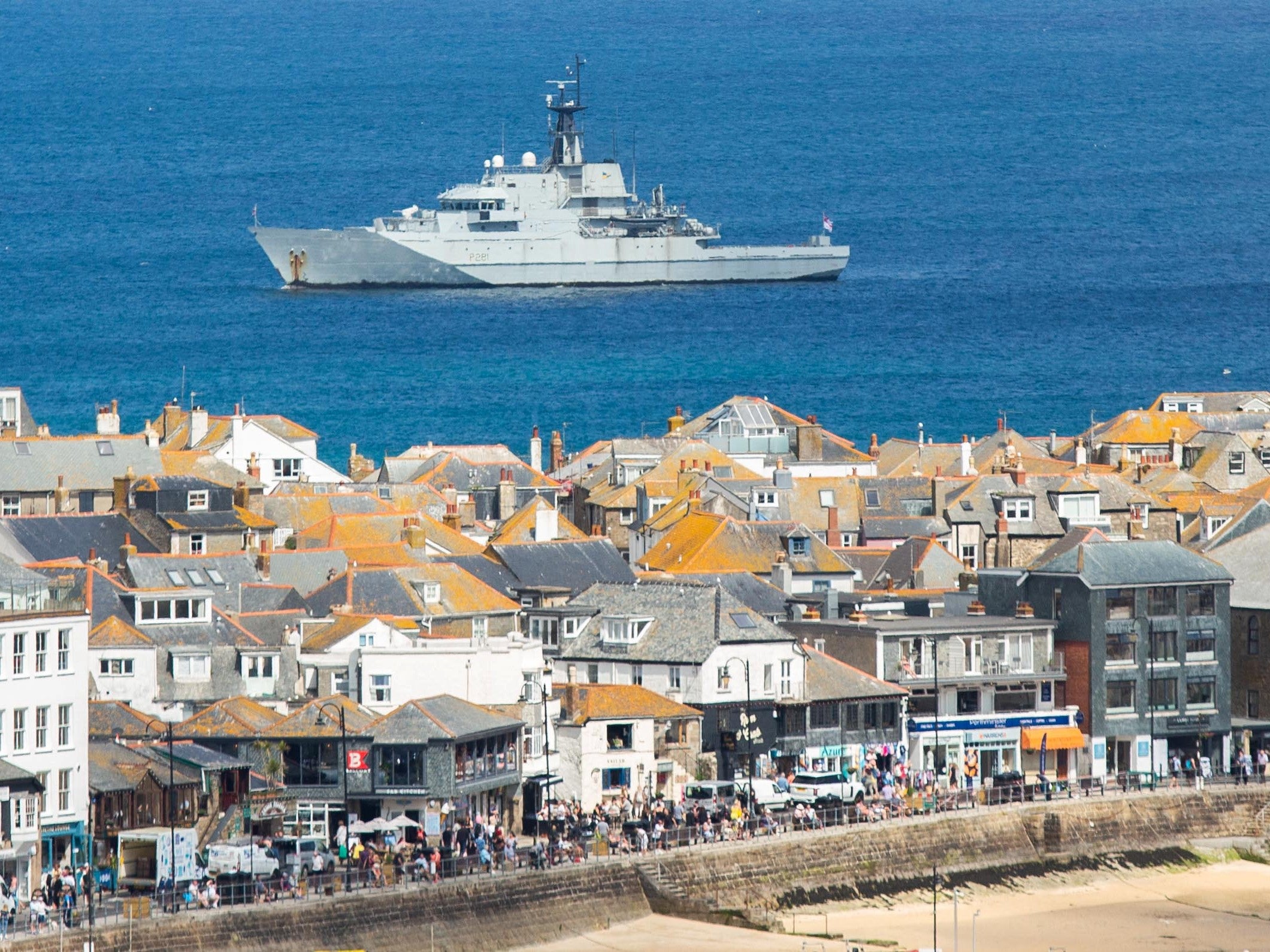 HMS Tyne is seen in just off the coast at the G7 summit site in St Ives, Cornwall, June 8 2021. Leaders from around the world are expected in the seaside town later this week.