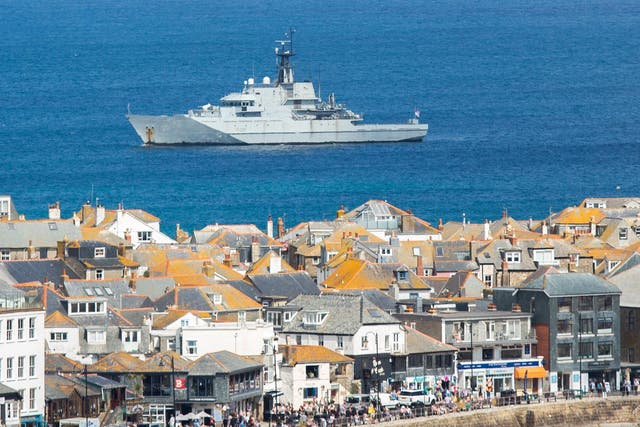 <p>HMS Tyne is seen in just off the coast at the G7 summit site in St Ives, Cornwall, June 8 2021. Leaders from around the world are expected in the seaside town later this week.</p>