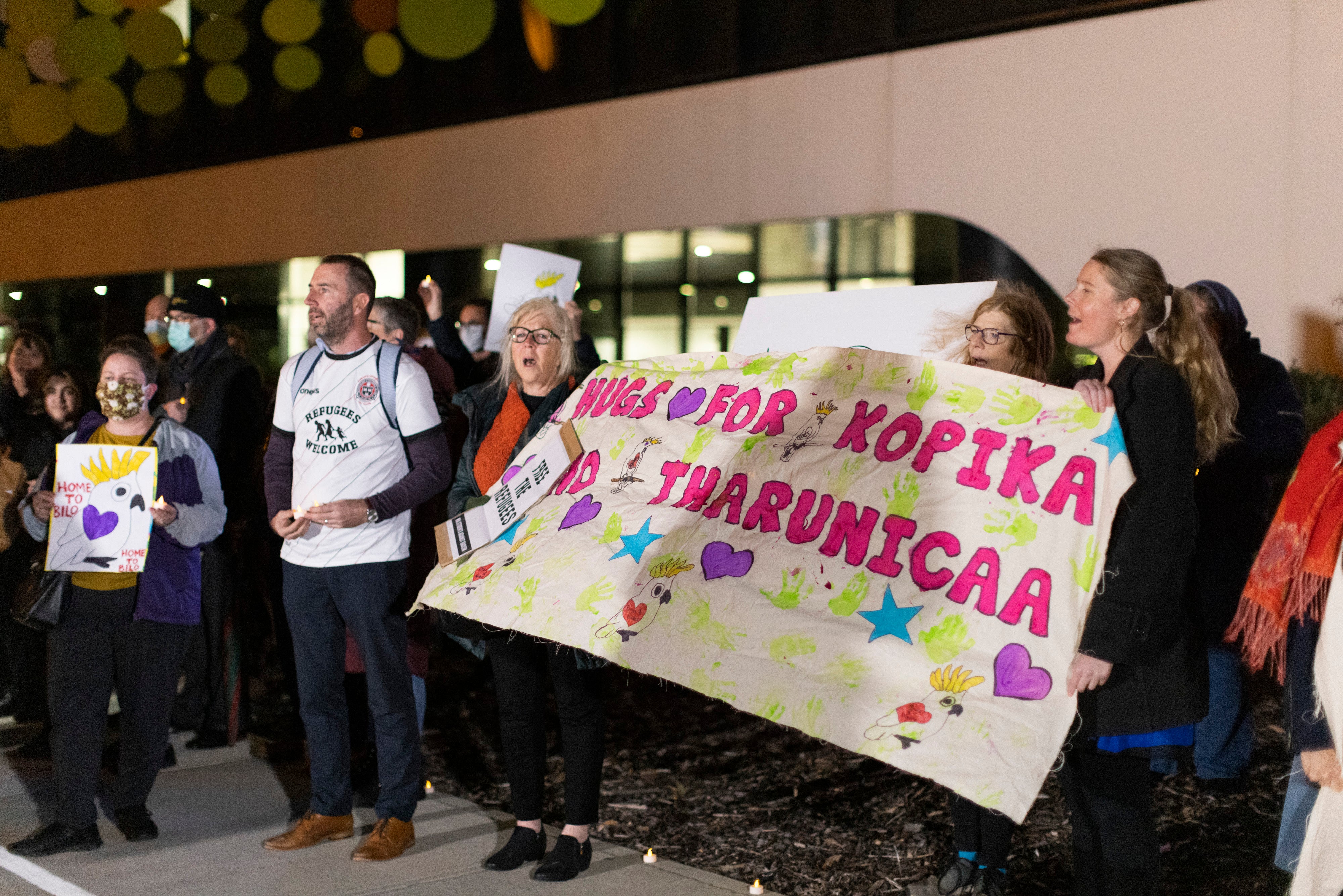 People seen outside the Perth Children’s Hospital on 9 June, 2021, where 3-year-old Tharnicaa is receiving medical care.