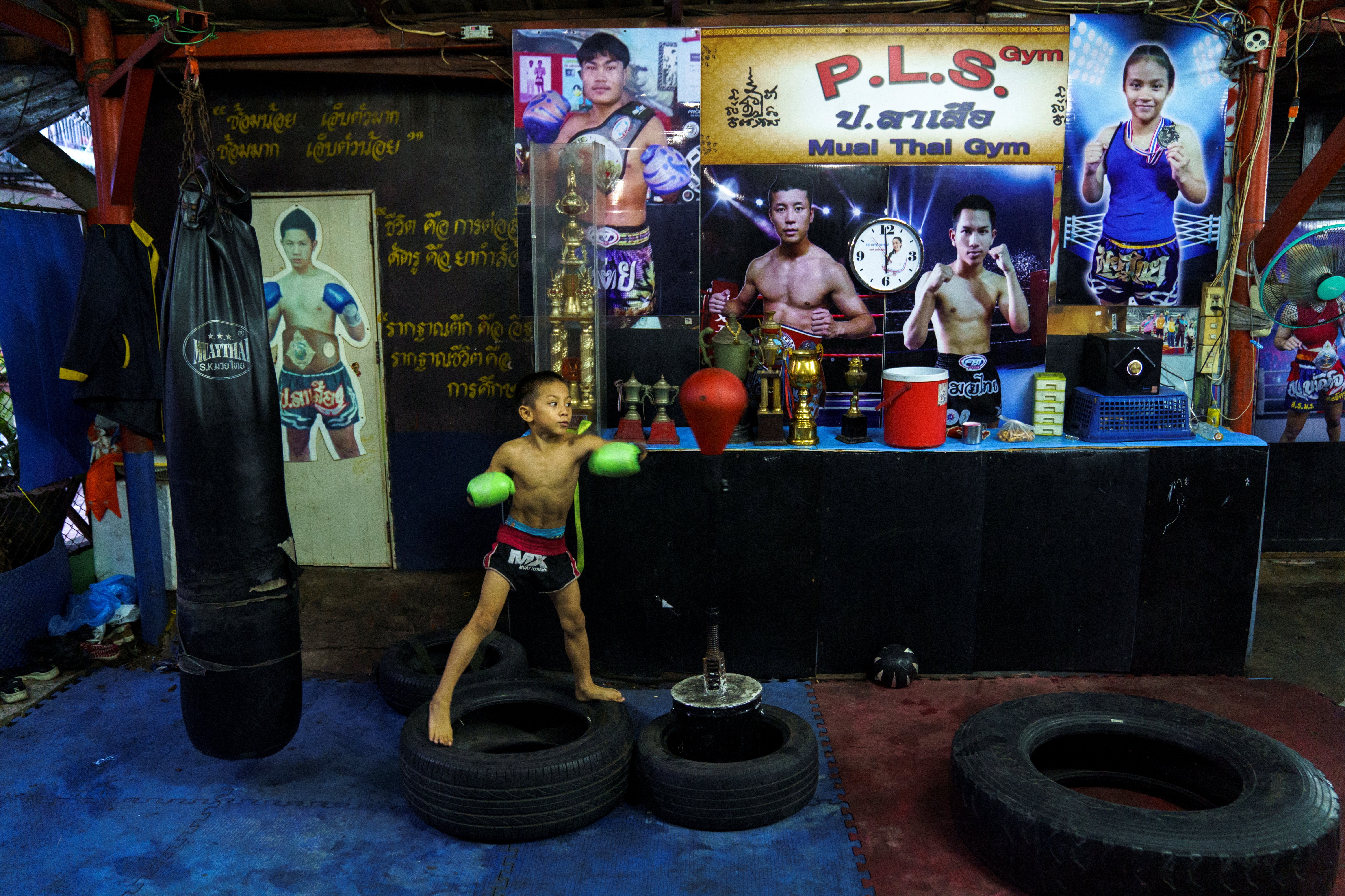 Pornpattara Peachurai, known as Tata Por Lasua in the ring, trains at a gym in Bangkok