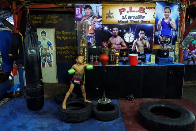 <p>Pornpattara Peachurai, known as Tata Por Lasua in the ring, trains at a gym in Bangkok</p>