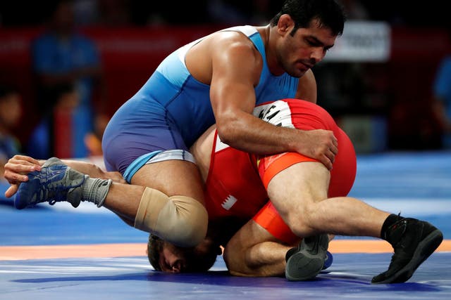<p>File Sushil Kumar of India in action at the 2018 Asian Games</p>