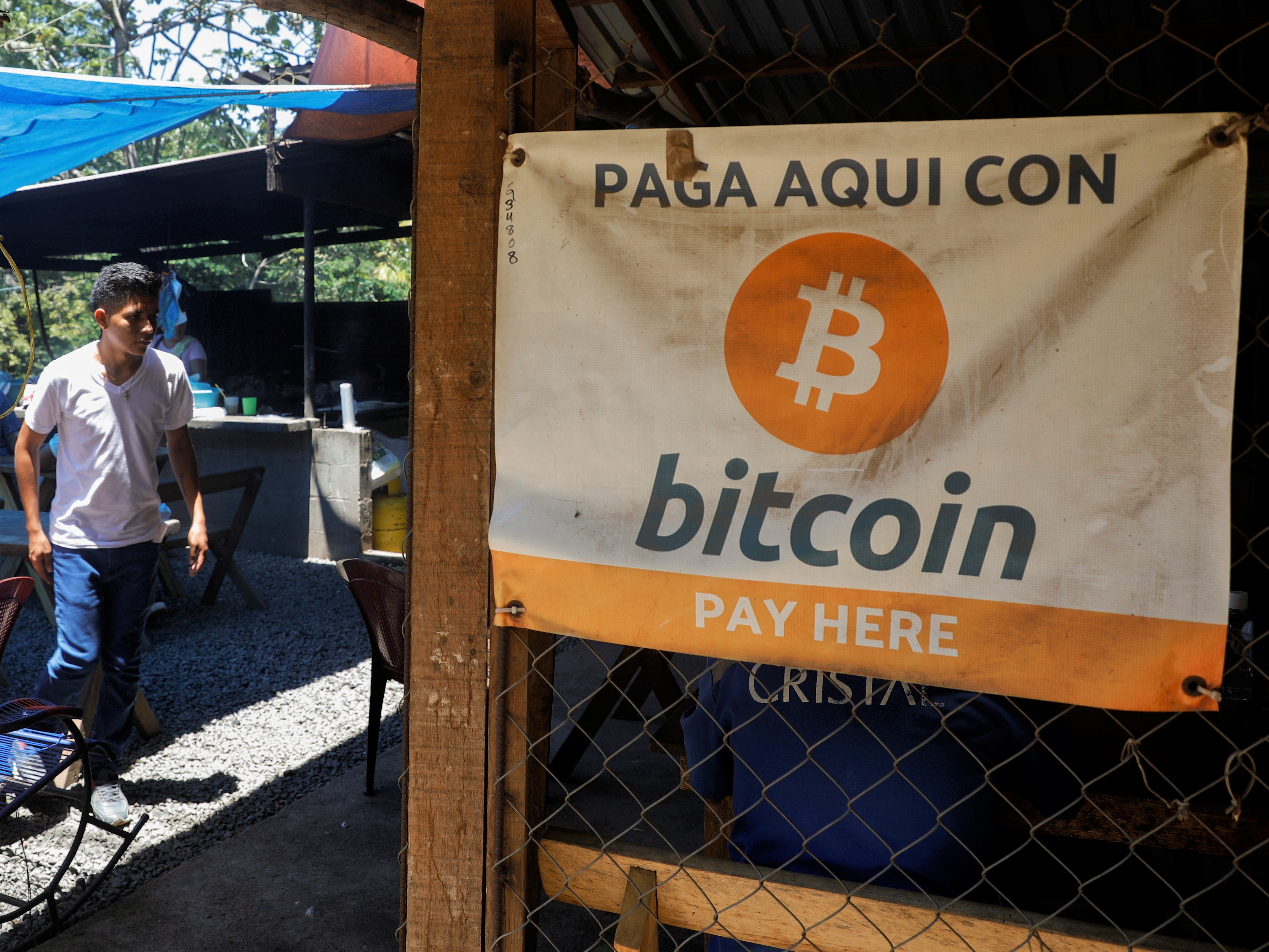 Bitcoin banners are seen outside of a small restaurant at El Zonte Beach in Chiltiupan, El Salvador 8 June, 2021
