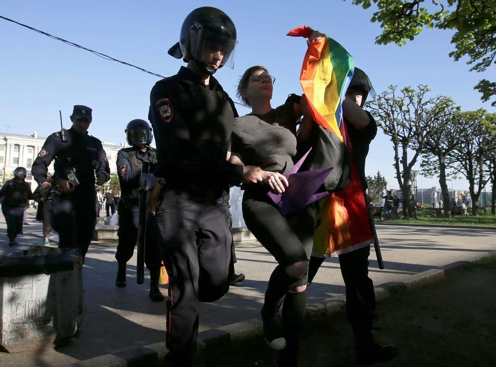 <p>Russian police arrest a LGBT+ campaigner in May 2019</p>