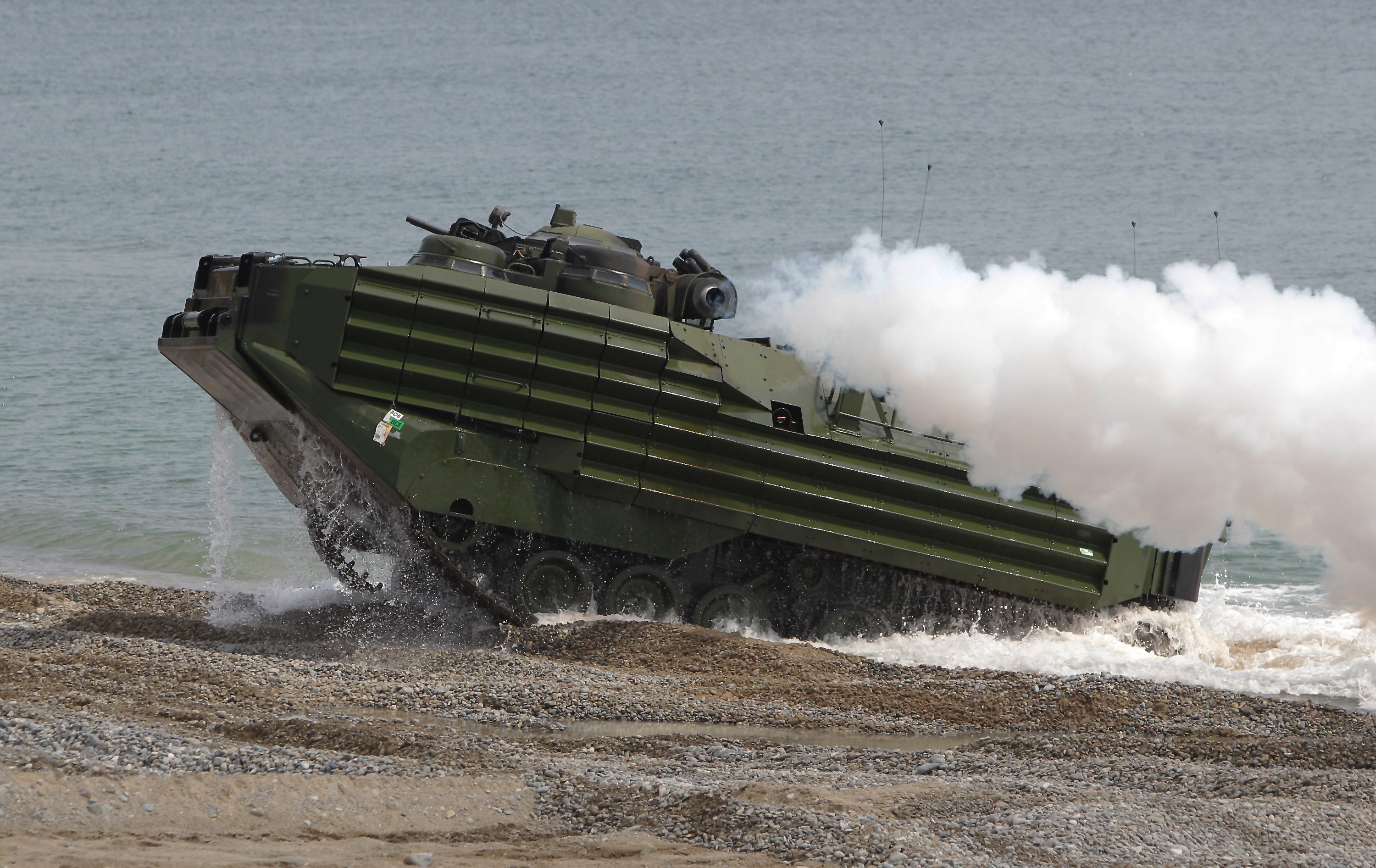 U.S. Marine's Amphibious Assault Vehicle (AAV) from 3rd Marine Expeditionary Force landing team deployed from Okinawa, Japan, move their position during the U.S. and South Korean Marines joint landing operation at Pohang seashore on April 26, 2013 in Pohang, South Korea