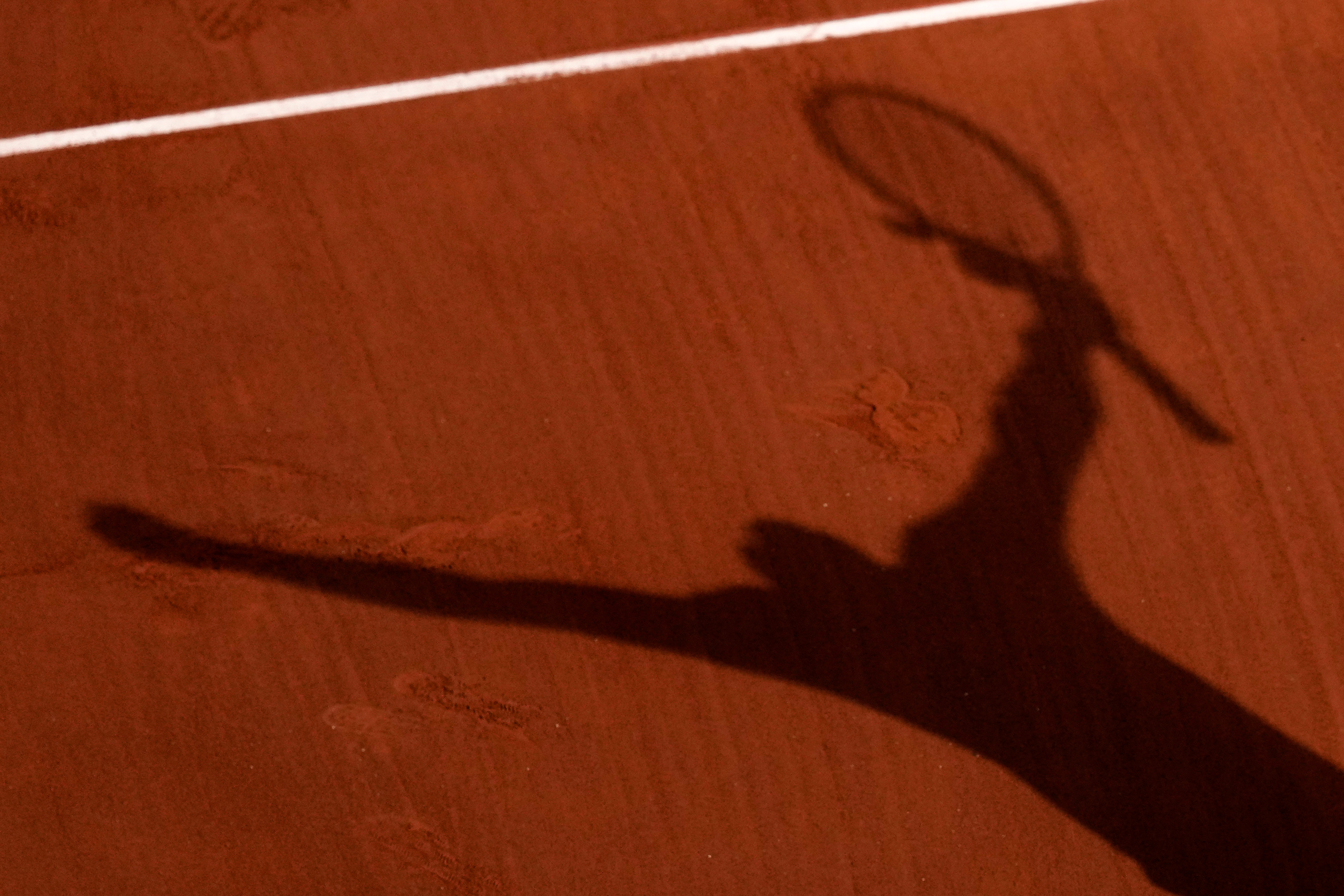 Rafael Nadal casts a celebratory shadow