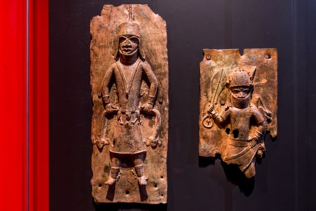 <p>Sculptures looted by British soldiers from the Kingdom of Benin in 1897 hangs on display in the ‘Where Is Africa’ exhibition at the Linden Museum on May 05, 2021 in Stuttgart, Germany</p>