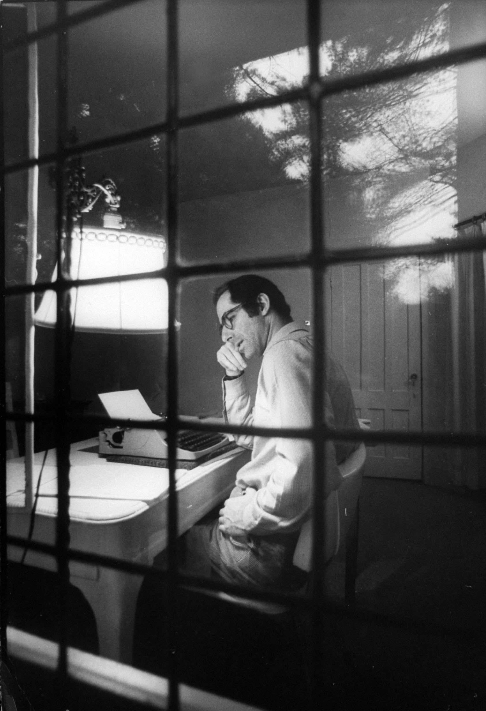 Philip Roth at his typewriter at Yaddo artists’ retreat in Saratoga Springs, New York