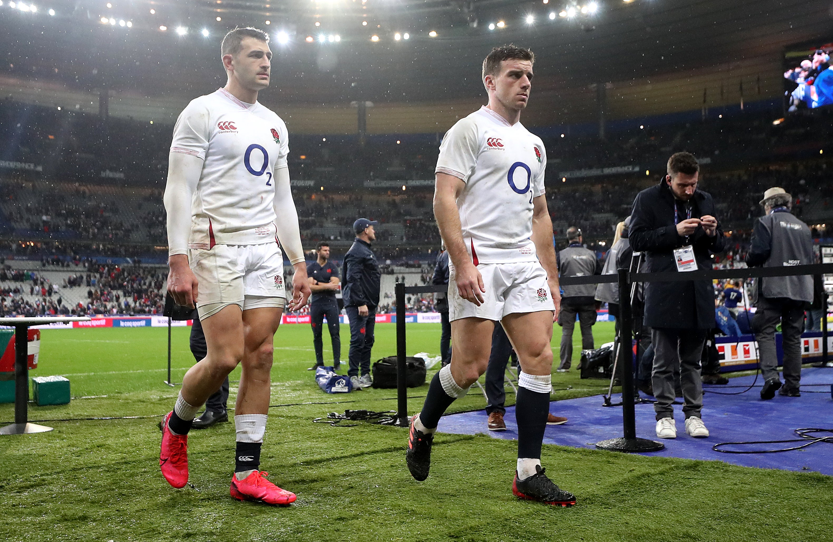 England's Jonny May (left) and George Ford walk off the pitch
