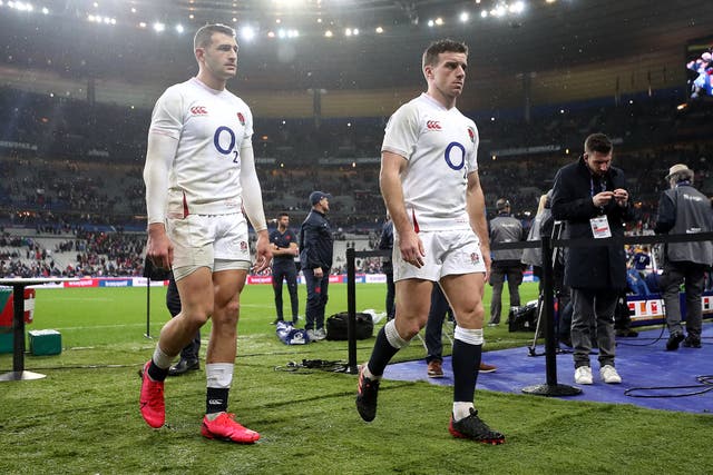 <p>England's Jonny May (left) and George Ford walk off the pitch</p>
