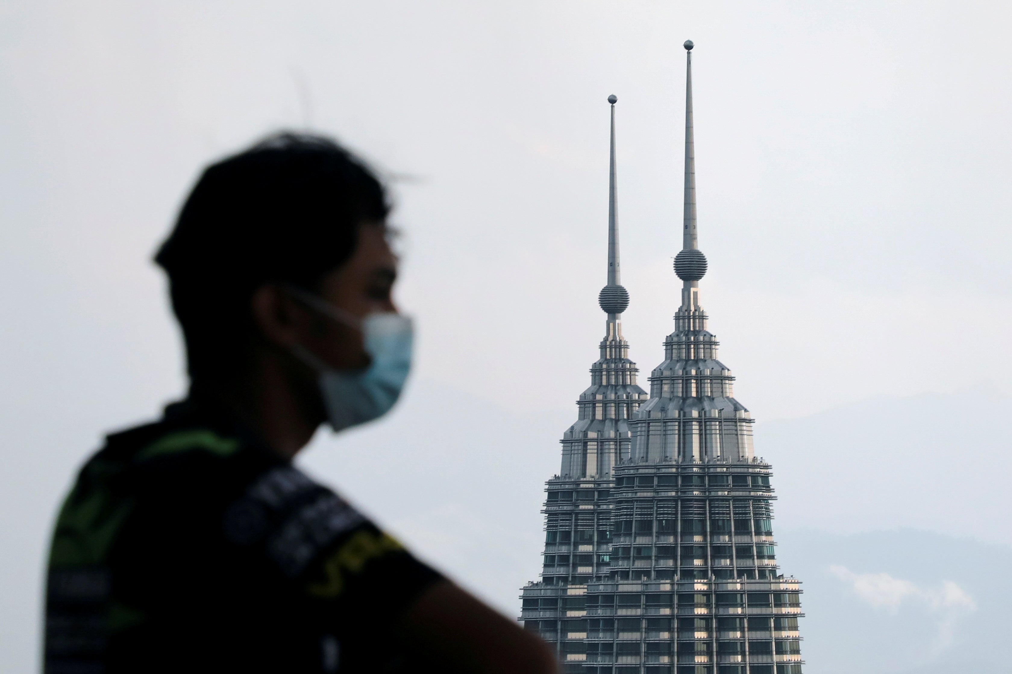 The aircraft was carrying two monks and military personnel for a ceremony to lay the foundations for a new monastery (pictured: Petronas Twin Towers in Kuala Lumpur)