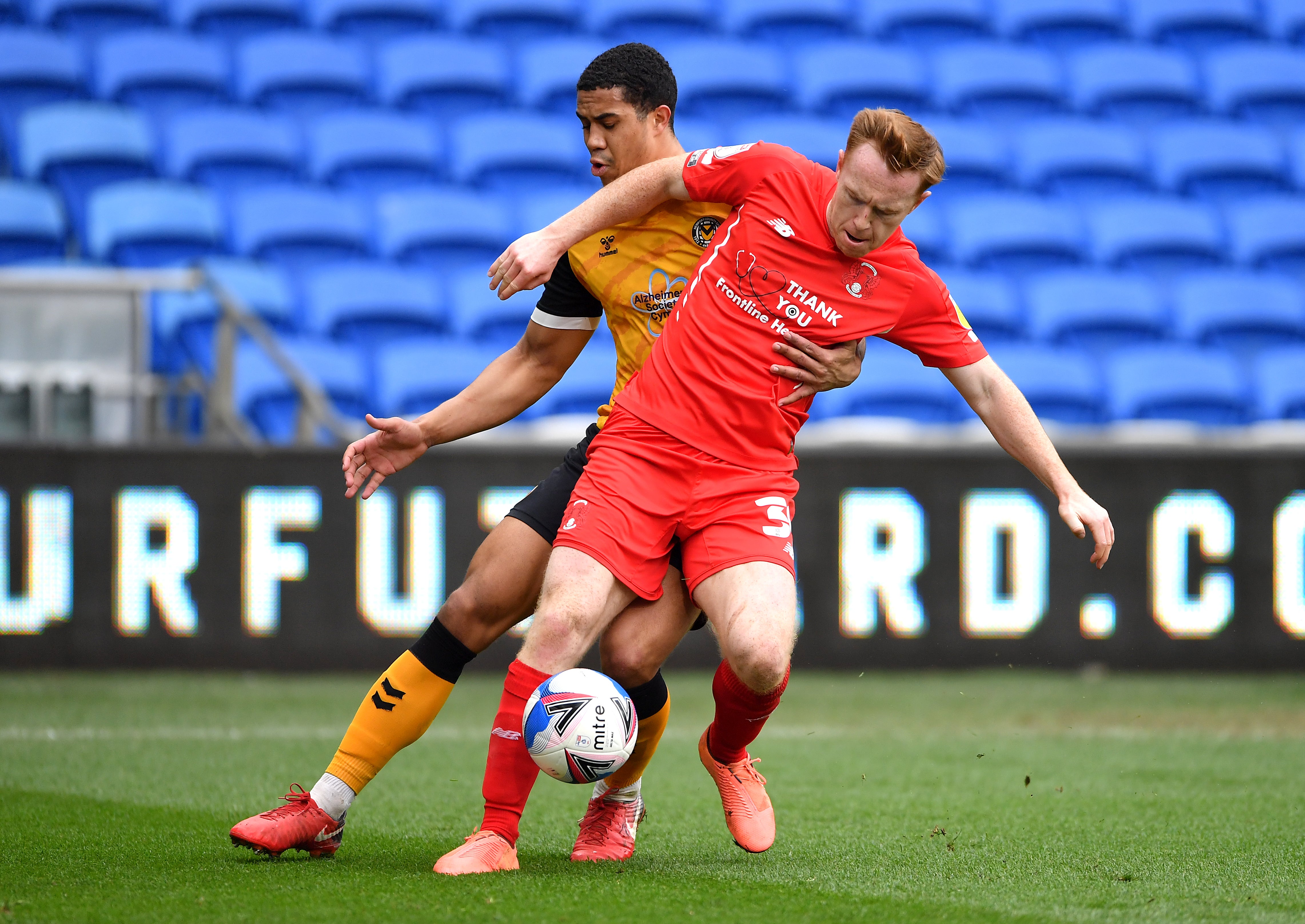 Newport County’s Priestley Farquharson (left) and Leyton Orient’s Danny Johnson battle for the ball during the Sky Bet League Two match at the Cardiff City Stadium, Cardiff.