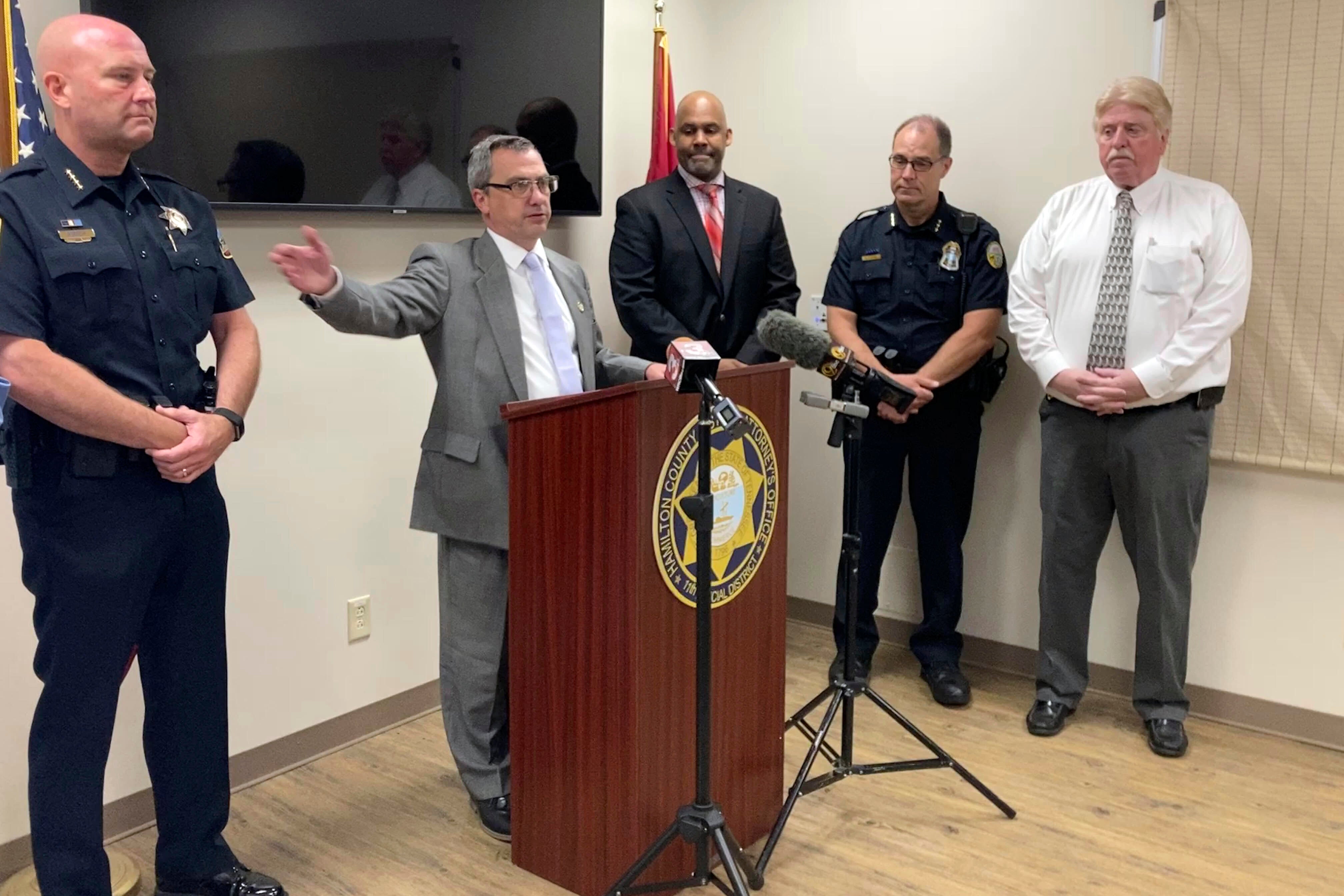 Hamilton County District Attorney Neal Pinkston, centre, speaks at a news conference, Wednesday, June 9, 2021, in Chattanooga, Tennessee