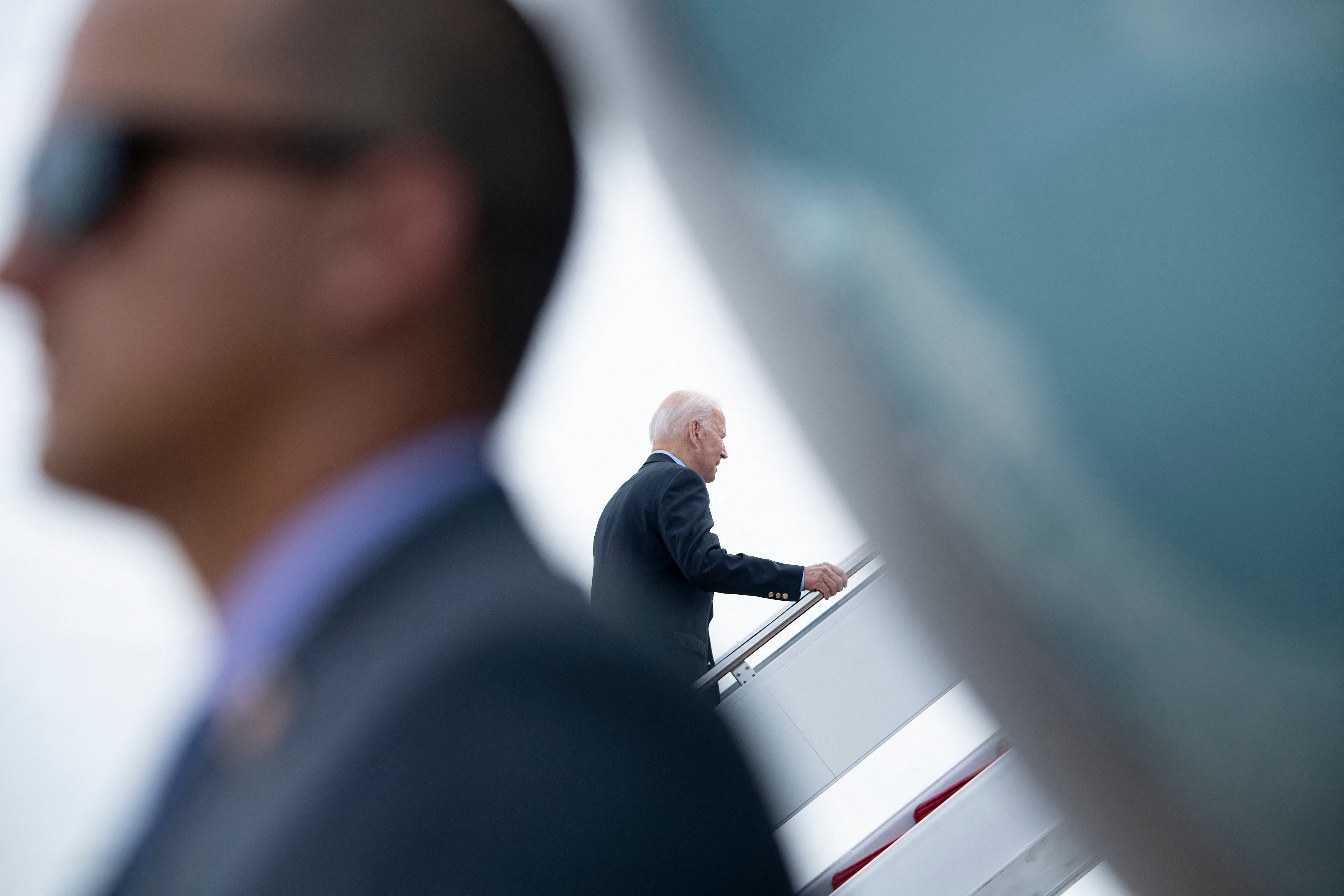 US President Joe Biden boards Air Force One at Andrews Air Force Base before departing for the UK and Europe to attend a series of summits