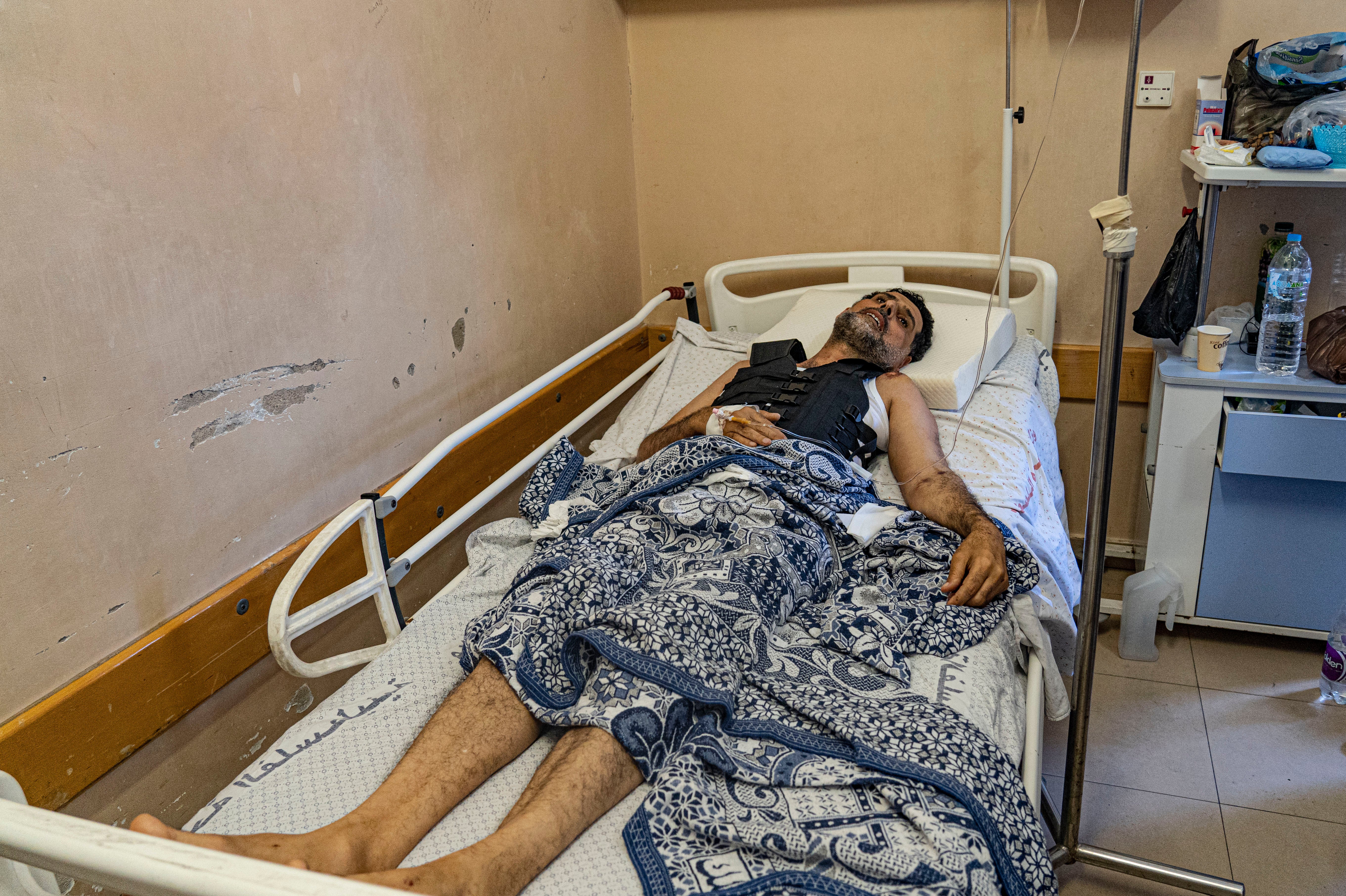 Shoukri Kollaq, who lost three children and his wife in the bombing, recovers in hospital