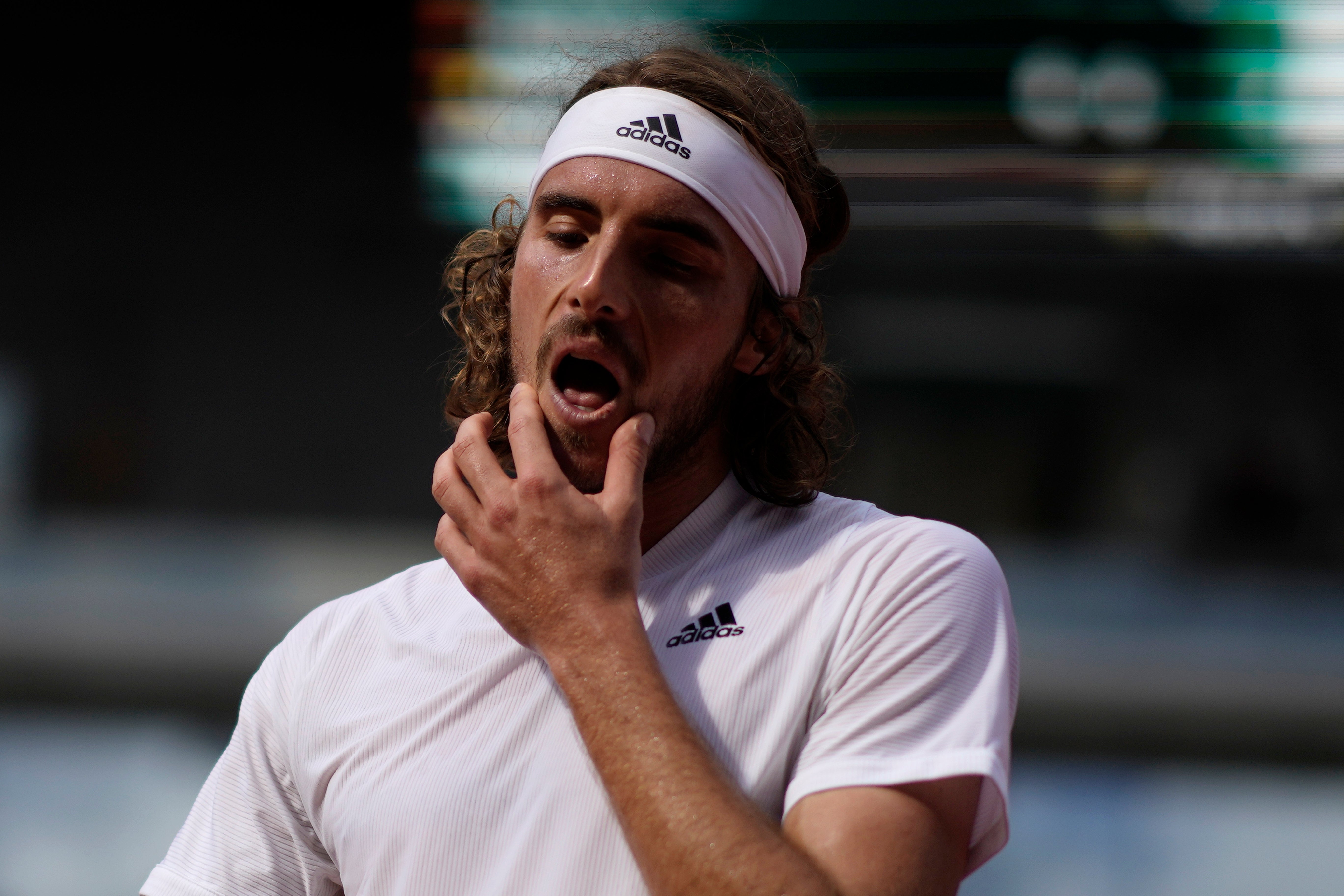 Stefanos Tsitsipas saw a two-set lead slip away but recovered to clinch victory