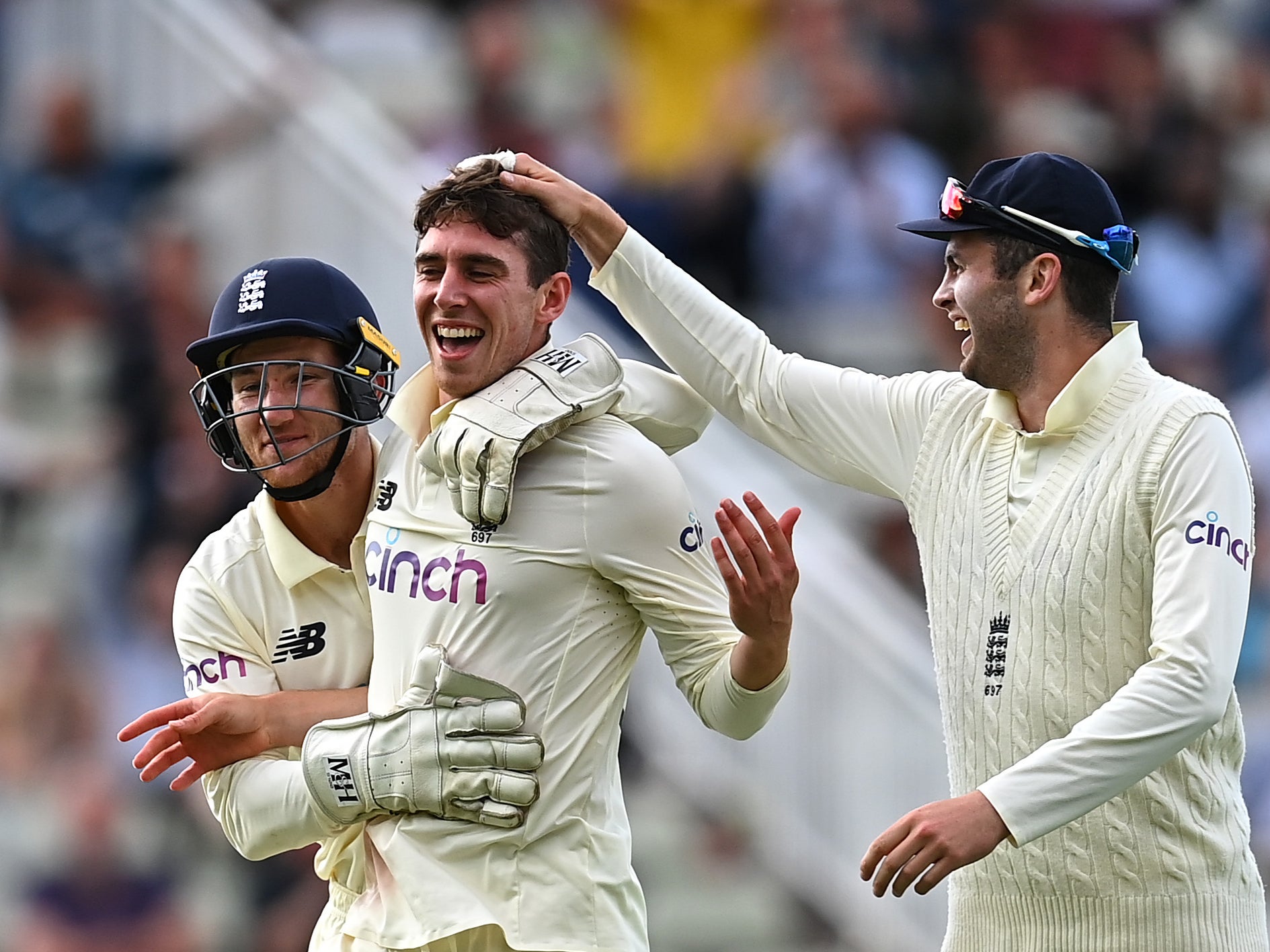 Dan Lawrence of England celebrates taking the wicket of Will Young of New Zealand