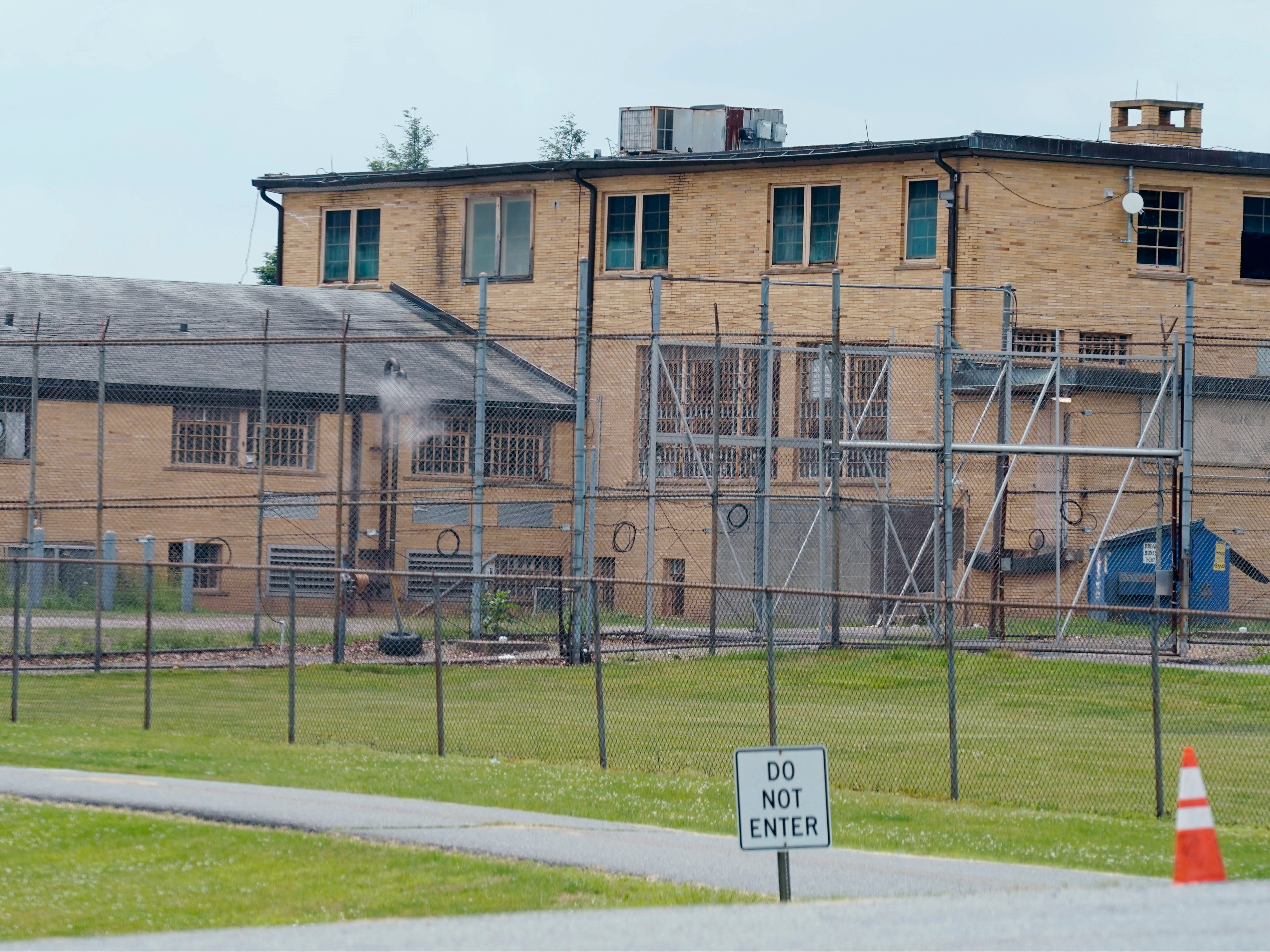 High fences surround buildings on the grounds of the Edna Mahan Correctional Facility for Women in Clinton, New Jersey