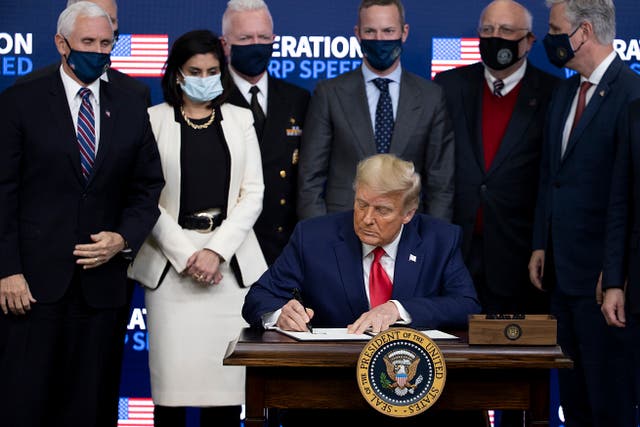 <p>President Donald Trump signed an executive at the Operation Warp Speed Vaccine Summit on December 08, 2020 in Washington, DC.  (Photo by Tasos Katopodis/Getty Images)</p>