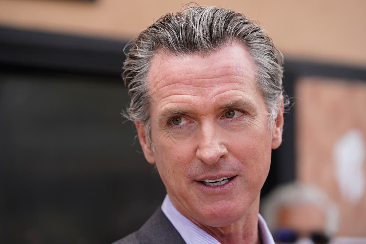 California governor signs orders to roll back virus rules 