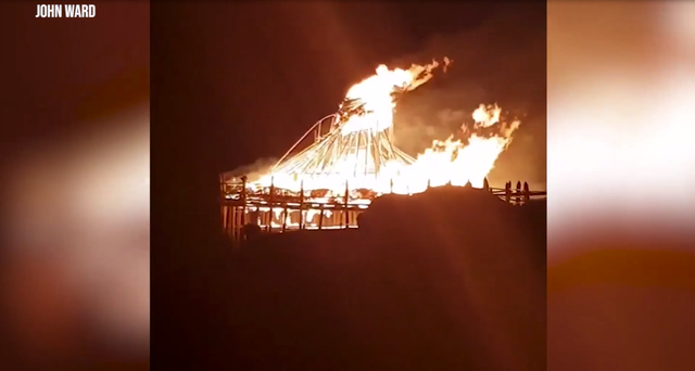 <p>Flames engulfed the roundhouse structure at the Scottish Crannog Centre on Friday evening</p>