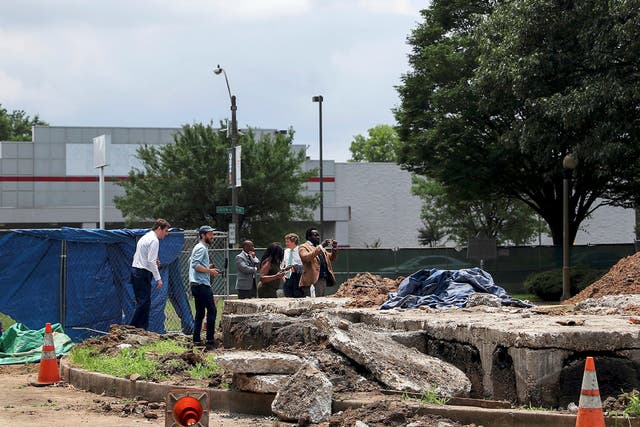 <p>Members of the Memphis Greenspace board take a look at the now former grave of Confederate Gen. Nathan Bedford Forrest, in Memphis, Tenn., on Friday, June 11, 2021.</p>