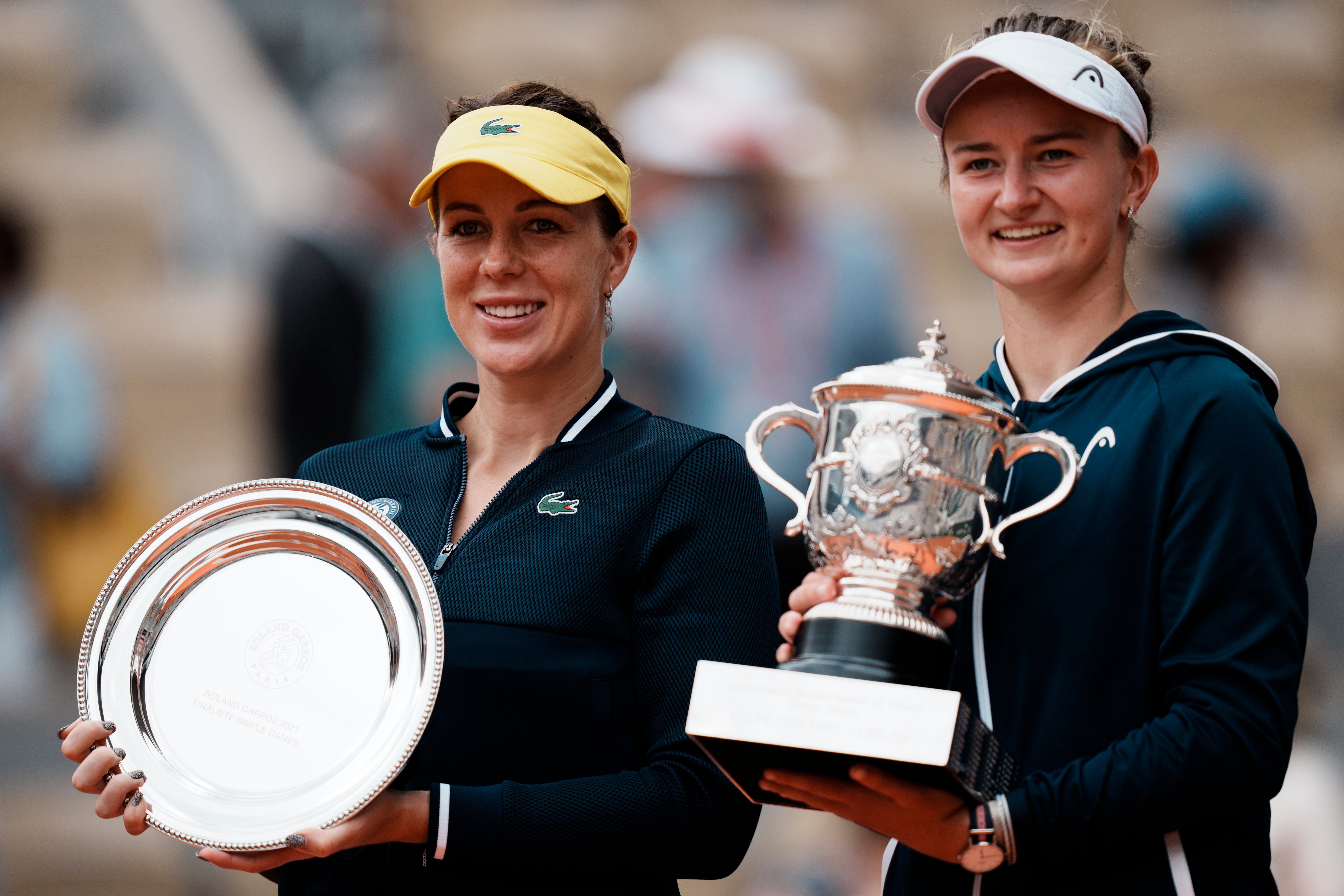 Barbora Krejcikova, right, and Anastasia Pavlyuchenkova hold their trophies