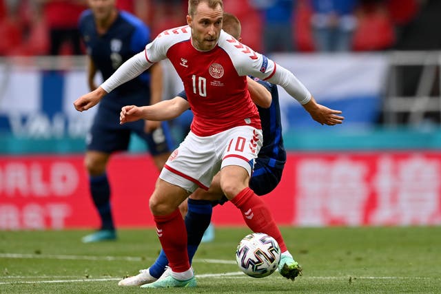 <p>Christian Eriksen on the ball before his collapse during the Euro 2020 match between Denmark and Finland in Copenhagen</p>