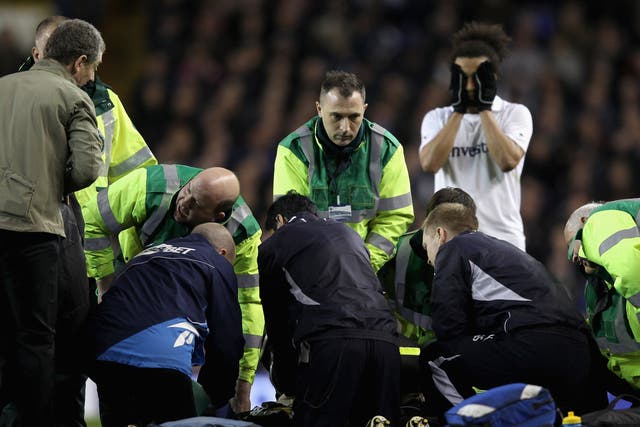 <p>Fabrice Muamba receives CPR after collapsing on the pitch at White Hart Lane on 17 March 2012</p>