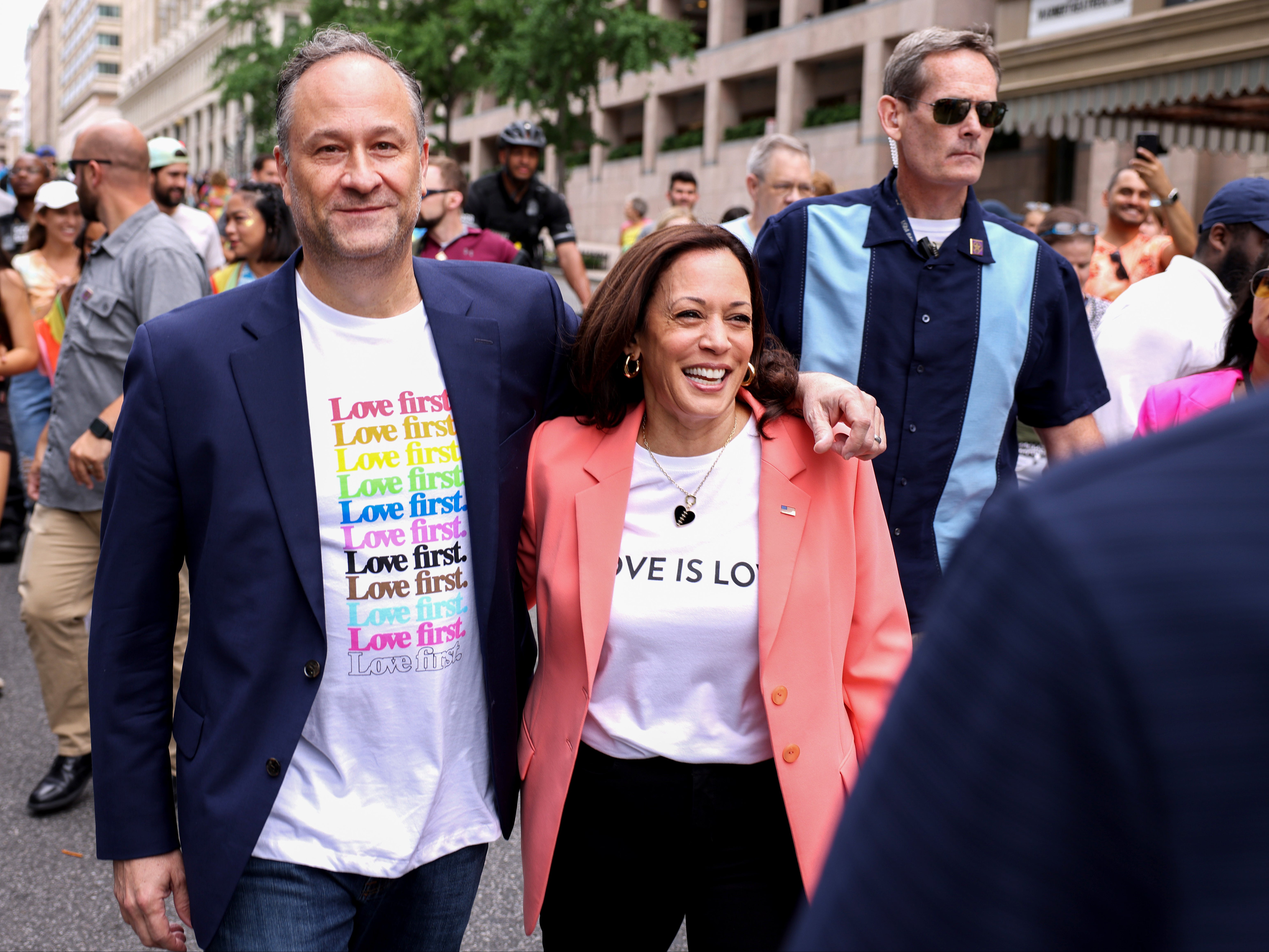 <p>Kamala Harris and husband Doug Emhoff join marchers for the Capital Pride Parade in Washington DC, on Saturday</p>