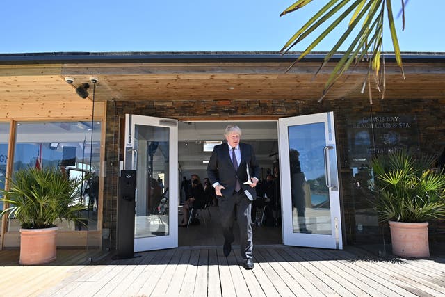 <p>Johnson leaves after a press conference on the final day of the summit in Cornwall</p>