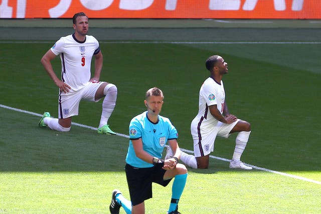 <p>England players show their opposition to racism before yesterday’s game against Croatia</p>