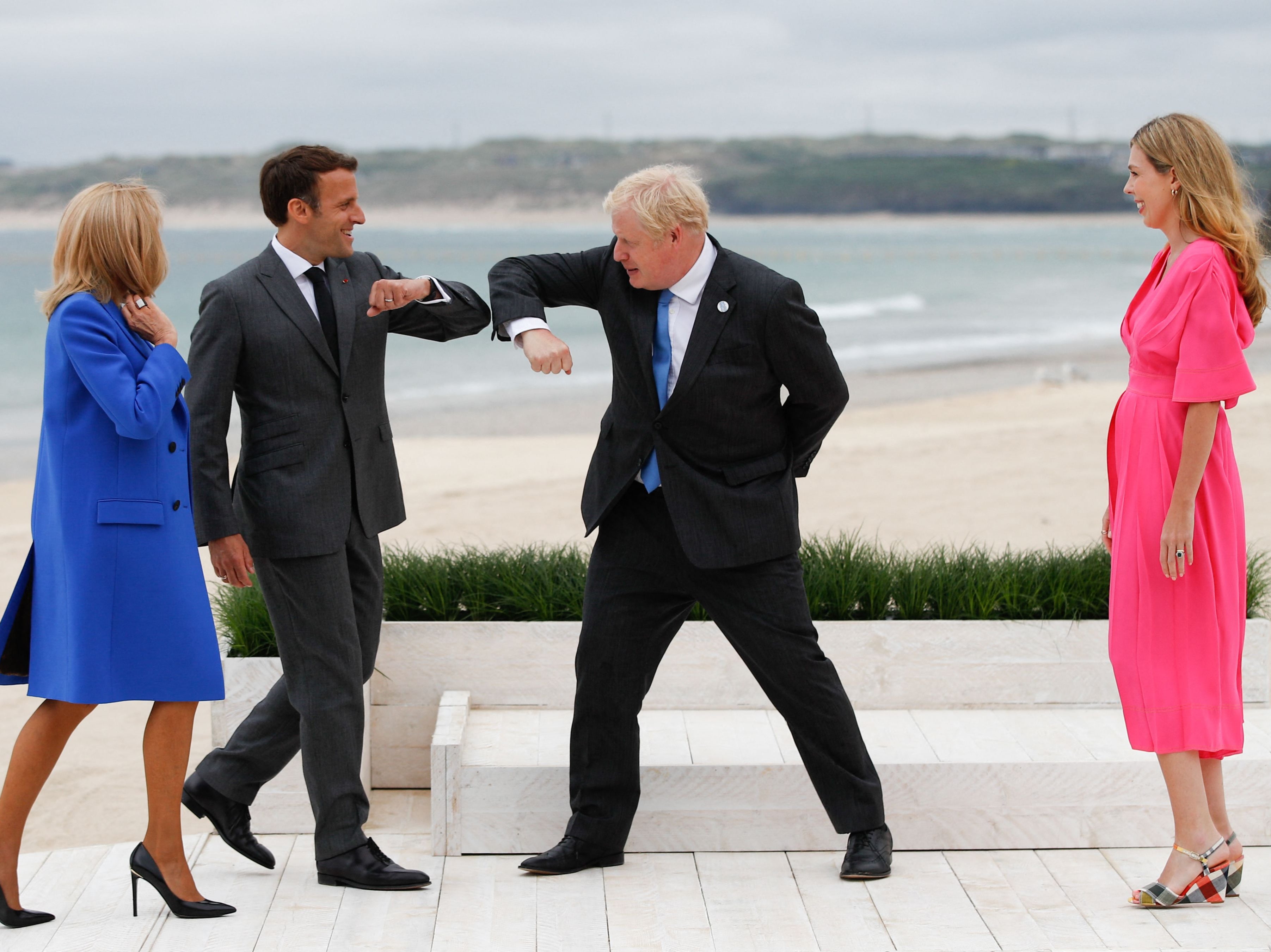 Boris Johnson and Carrie Johnson greet Emmanuel Macron and Brigitte Macron