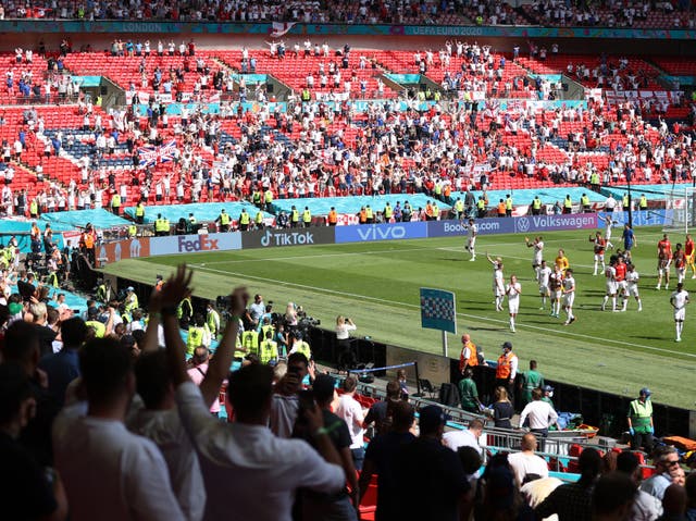 <p>England fans salute their players on a 1-0 win</p>